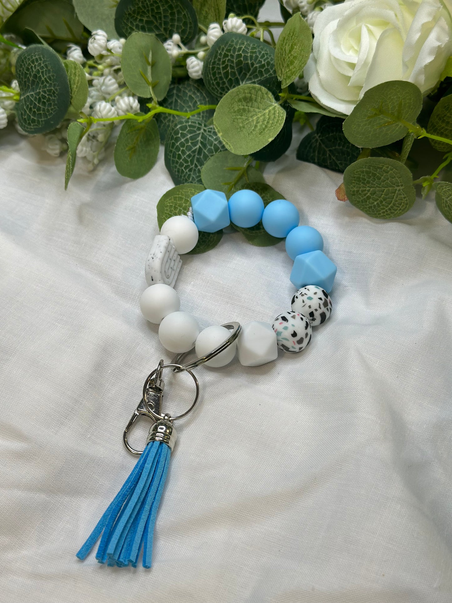 Blue and white speckled beaded keychain